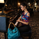 "Comfortable Chic" A Turquoise Opulent Python Shoulder Bag