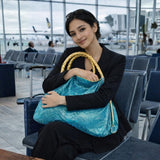 "Comfortable Chic" A Turquoise Opulent Python Shoulder Bag